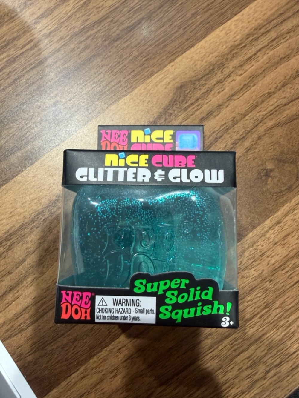NeeDoh Nice Cube Glitter & Glow Super Solid Squish - Teal Glitter
